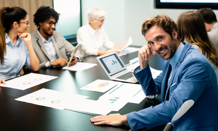 group-of-business-partners-discussing-documents-an-2021-08-30-20-49-20-utc